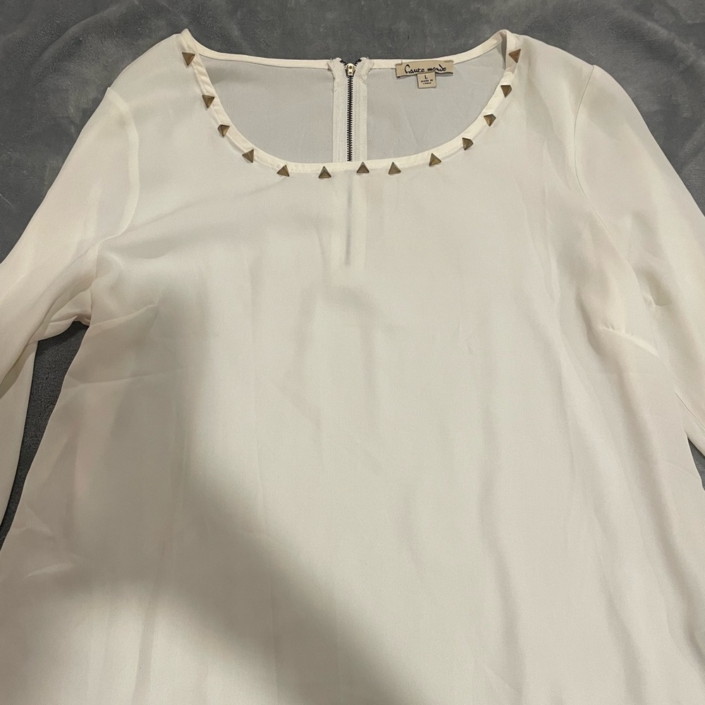 white and gold blouse